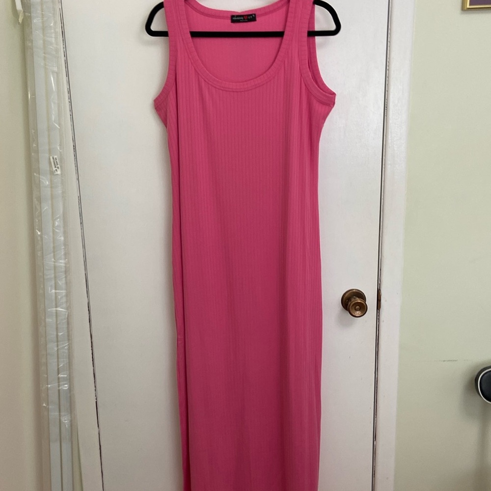 Absolutely love It full length sleeveless dress.New with tags